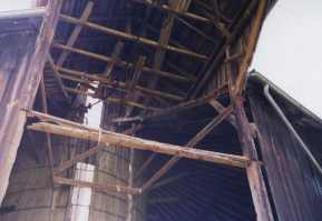 view under porch roof of center silo