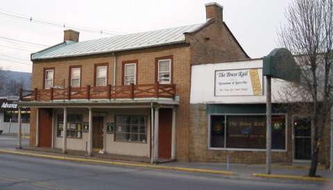Saville law office with Green Palm Restaurant next to it.